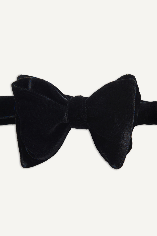 Butterfly selvbinder